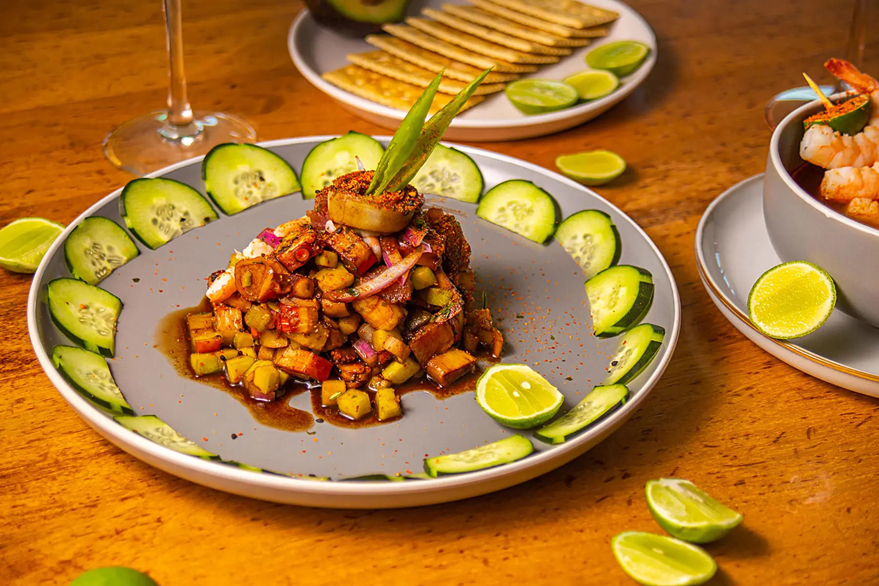 Shrimp ceviche, kanikama, tuna, octopus, red onion, cucumber and black pearl sauce with lemons and crackers from Hotel Oceano Palace Mazatlán